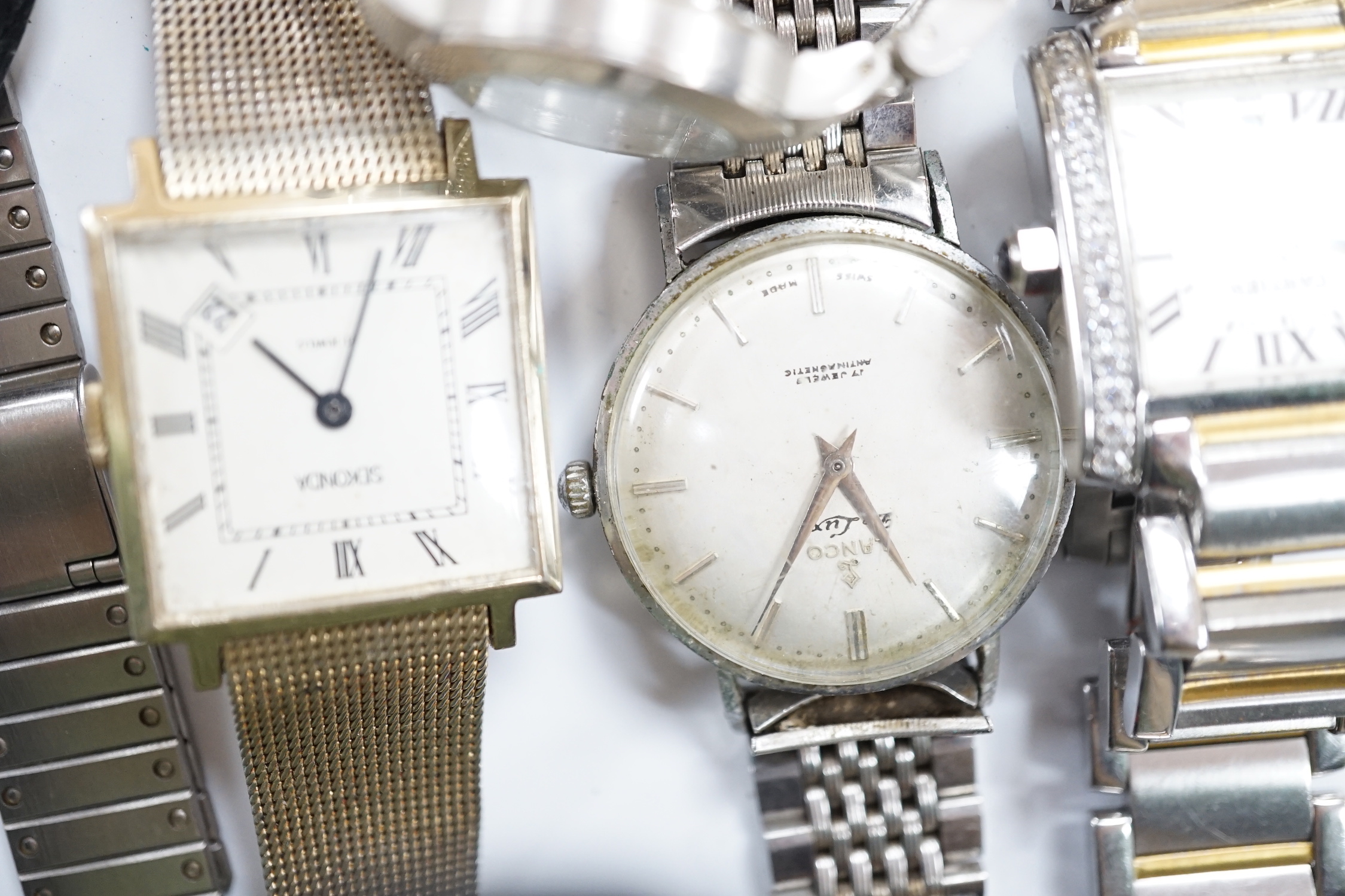 A large quantity of assorted mainly modern wrist watches, wrist and pocket movements, straps, bracelets, etc.